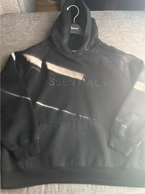 Essentials Black Pullover Hoodie with Subtle Chest Tag